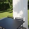 Outdoor-Vorhang MYKONOS in schönem Gartensitzplatz.